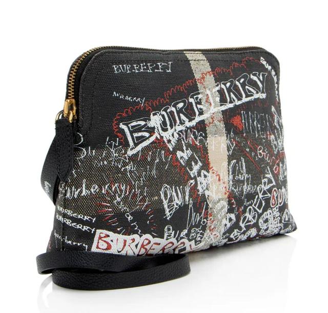 https://cdn.reebelo.com/pim/products/P-BURBERRYMEGACHECKDOODLEPOUCH/WHI-image-1.jpg