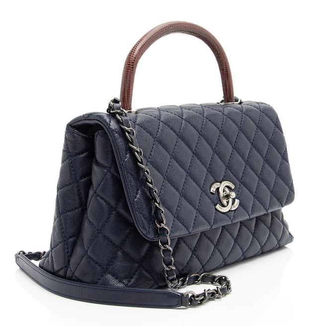 https://cdn.reebelo.com/pim/products/P-CHANELCAVIARLEATHERLIZARDCOCOSMALLTOPHANDLE/BLU-image-1.jpg