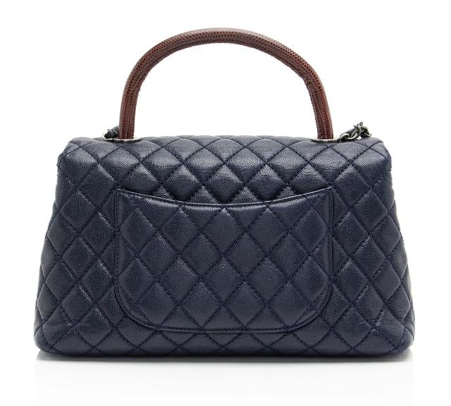 https://cdn.reebelo.com/pim/products/P-CHANELCAVIARLEATHERLIZARDCOCOSMALLTOPHANDLE/BLU-image-2.jpg