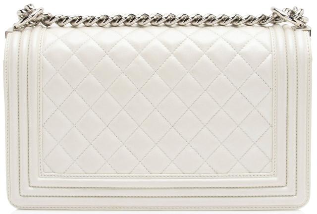https://cdn.reebelo.com/pim/products/P-CHANELIRIDESCENTCALFSKINOLDMEDIUMBOYBAG/WHI-image-2.jpg