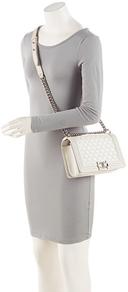 https://cdn.reebelo.com/pim/products/P-CHANELIRIDESCENTCALFSKINOLDMEDIUMBOYBAG/WHI-image-4.jpg