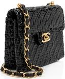 https://cdn.reebelo.com/pim/products/P-CHANELVINTAGERATTANWICKERFLAPBAG/BLA-image-1.jpg