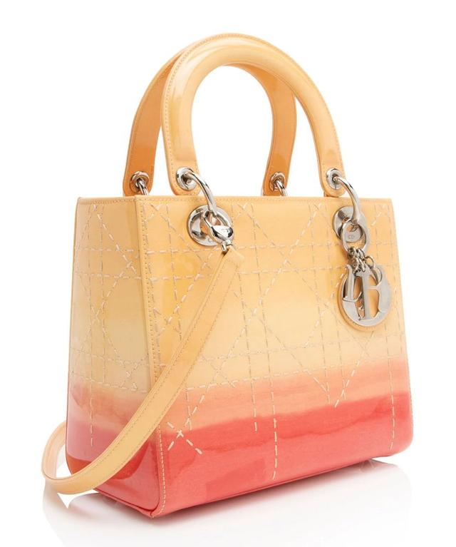 https://cdn.reebelo.com/pim/products/P-DIORPATENTLEATHEROMBRELADYDIORMEDIUMTOTE/PIN-image-1.jpg