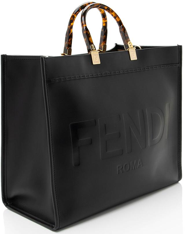 https://cdn.reebelo.com/pim/products/P-FENDILEATHERSUNSHINELARGESHOPPERTOTE/BLA-image-1.jpg