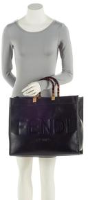 https://cdn.reebelo.com/pim/products/P-FENDILEATHERSUNSHINELARGESHOPPERTOTE/BLA-image-4.jpg