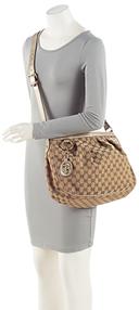 https://cdn.reebelo.com/pim/products/P-GUCCIGGCANVASSUKEYMESSENGER/BRO-image-4.jpg