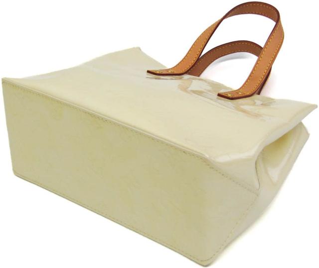 https://cdn.reebelo.com/pim/products/P-LOUISVUITTONREADEPMMONOGRAMVERNISHANDBAG/WHI-image-1.jpg