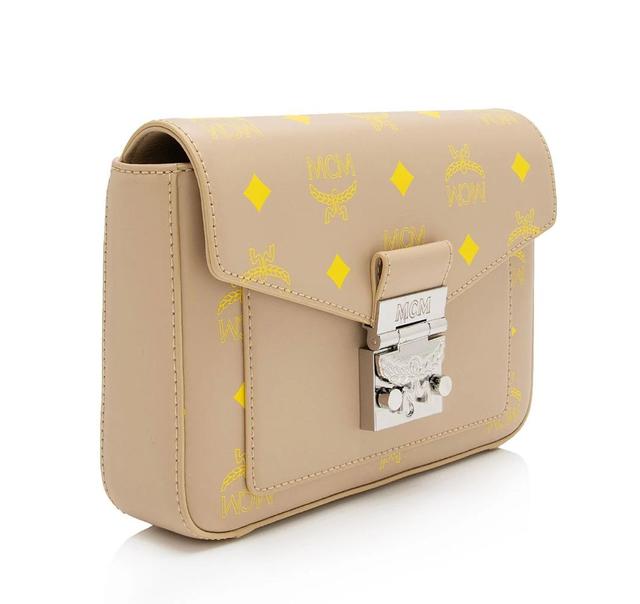 https://cdn.reebelo.com/pim/products/P-MCMLEATHERCOLORSPLASHMILLIESMALLCROSSBODY/YEL-image-1.jpg