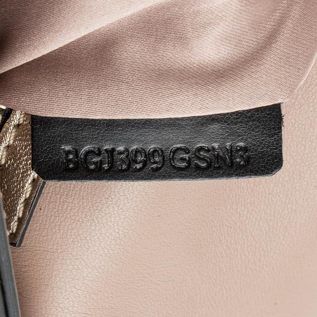 https://cdn.reebelo.com/pim/products/P-VALENTINOMETALLICNAPPALEATHERROCKSTUDCLUTCH/GOL-image-3.jpg